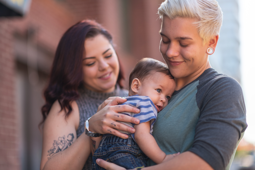 Happy Baby on Women's Lap